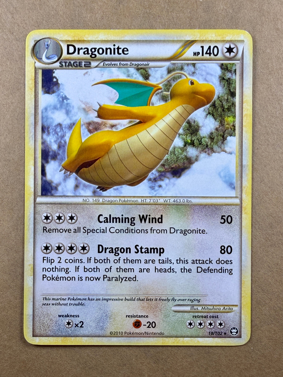 Front of 2010 Pokémon Triumphant Dragonite #18/102 Non-Holo Rare in Lightly Played condition.