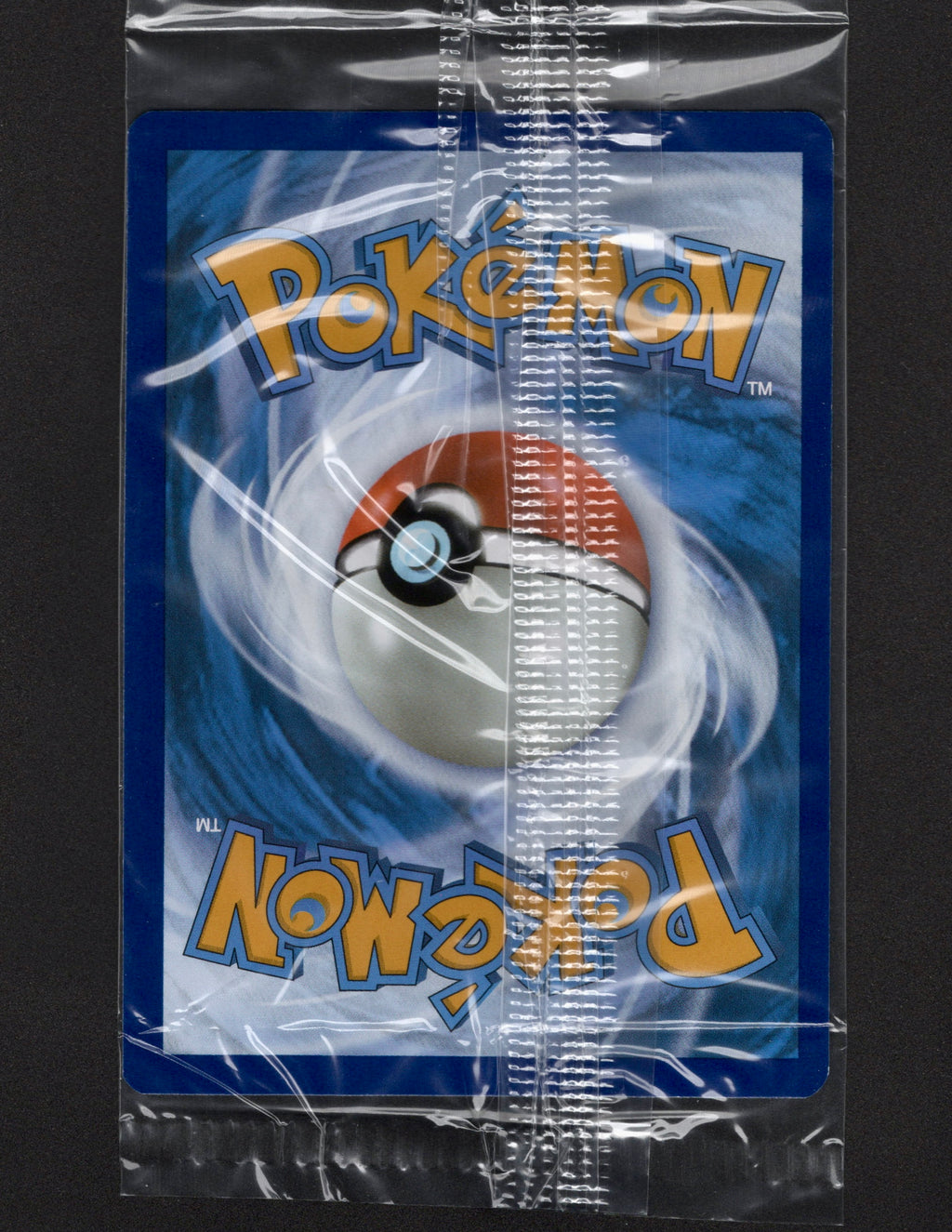 Back of the factory-sealed Charmander SVP 044 promo card showing the Pokémon card back through the clear wrapper.