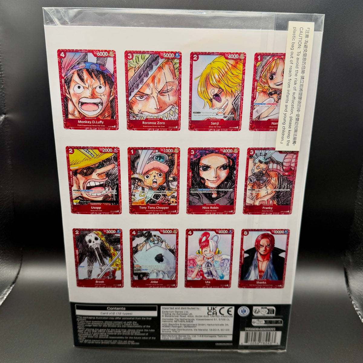 Back of the sealed 2023 One Piece Card Game FILM RED Premium Card Collection with card checklist and UPC