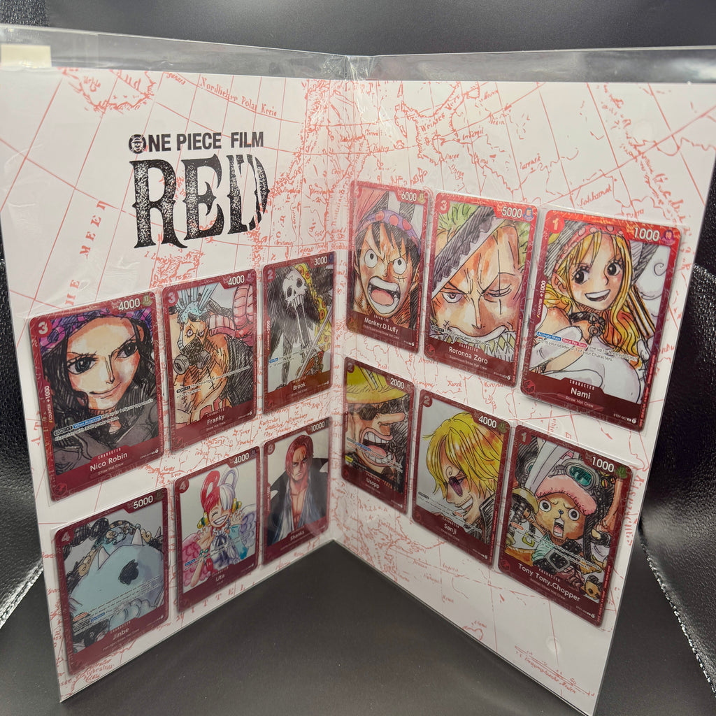 Inside display of the 2023 One Piece Card Game FILM RED Premium Card Collection showing 12 foil cards
